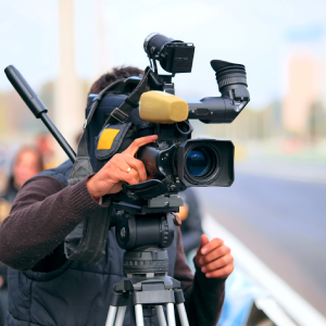 A camera man shooting with camera