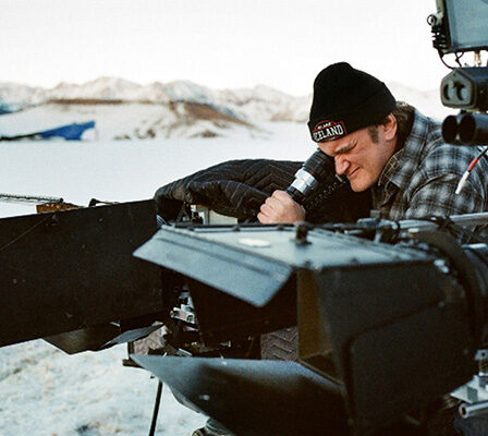 A Camera Man Working With His Professional Camera.