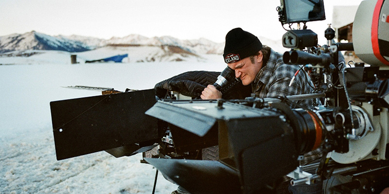 A Camera Man Working With His Professional Camera.